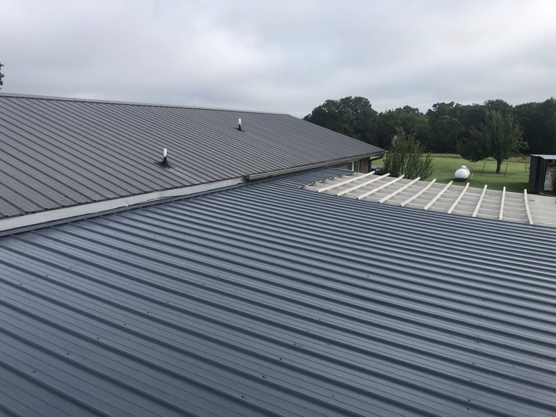 Standing-seam metal roof on a large building